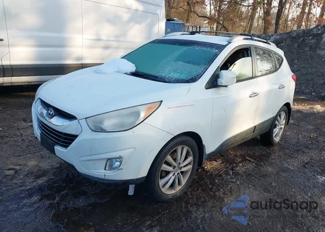 2012 Hyundai Tucson Limited из США, поврежденный, VIN KM8JUCAC5CU382313